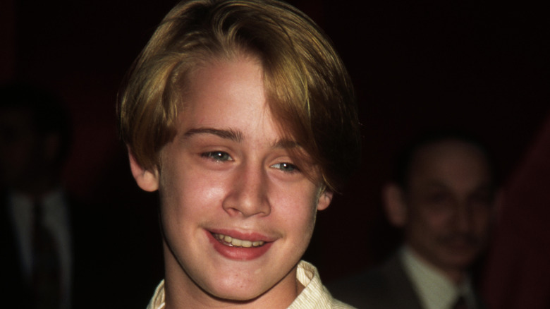 Macaulay Culkin smiling as a child