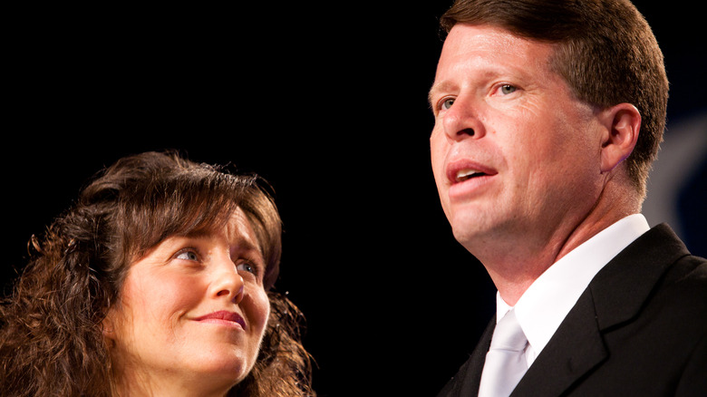 Michelle Duggar looking up lovingly at Jim Bob Duggar