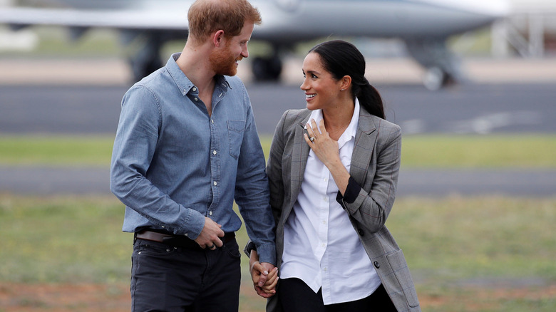 Prince Harry and Meghan Markle stare lovingly at each other