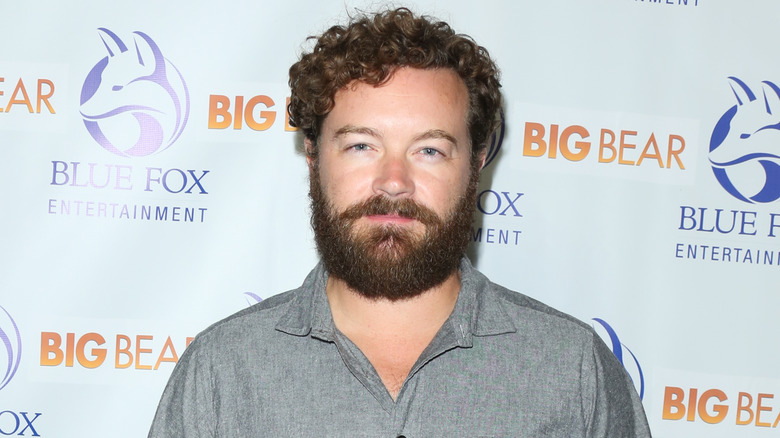 Danny Masterson looking into camera at premier event