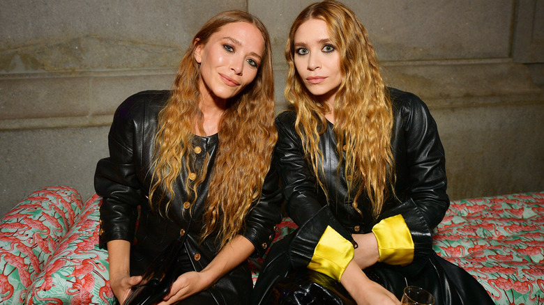 Mary-Kate Olsen and Ashley Olsen attend The 2019 Met Gala Celebrating Camp.