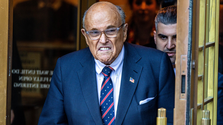 Rudy Giuliani, the former personal lawyer for former U.S. President Donald Trump, speaks with reporters outside of the E. Barrett Prettyman U.S. District Courthouse after a verdict was reached in his defamation jury trial on December 15, 2023 in Washington, DC.