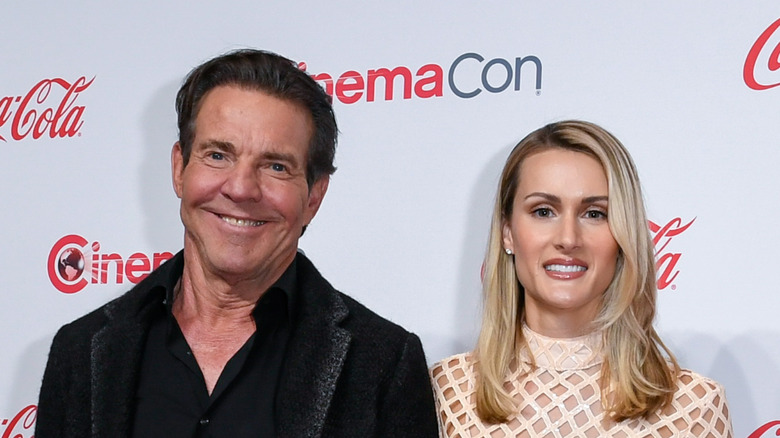 Dennis Quaid and Laura Savoie posing at CinemaCon in 2024