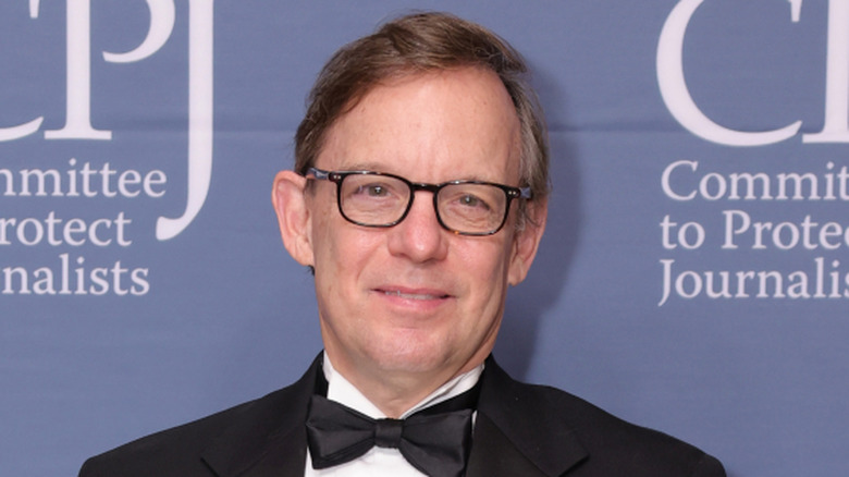 Eric Shawn posing at an event
