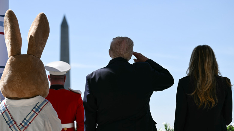 U.S. President Donald Trump and first lady Melania Trump arrive with the Easter Bunny on the balcony for the White House Easter Egg Roll on the South Lawn of the White House on April 06, 2026 in Washington, DC