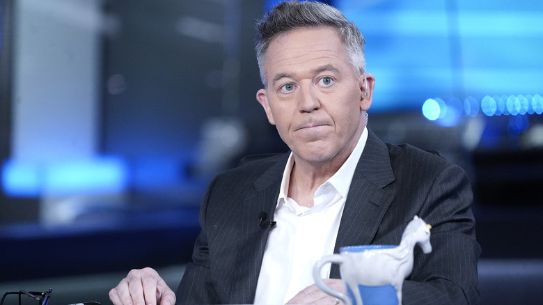 Greg Gutfeld pursing his lips