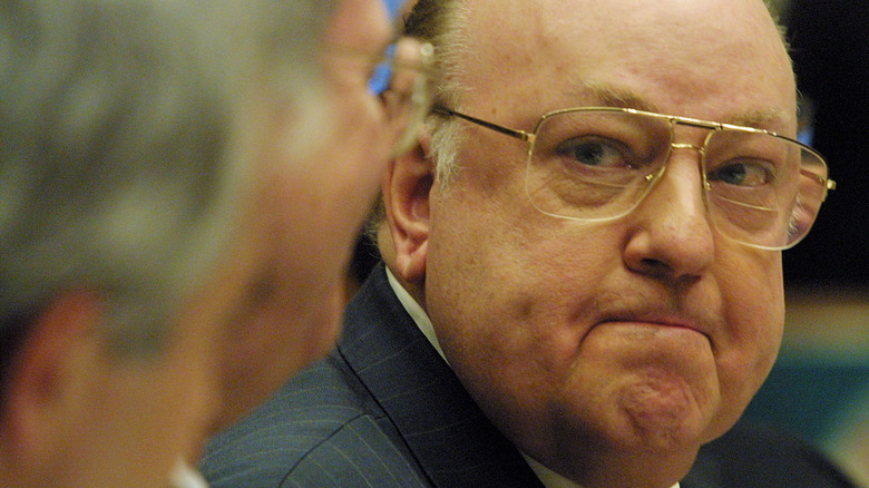 Closeup of Roger Ailes pursing his lips