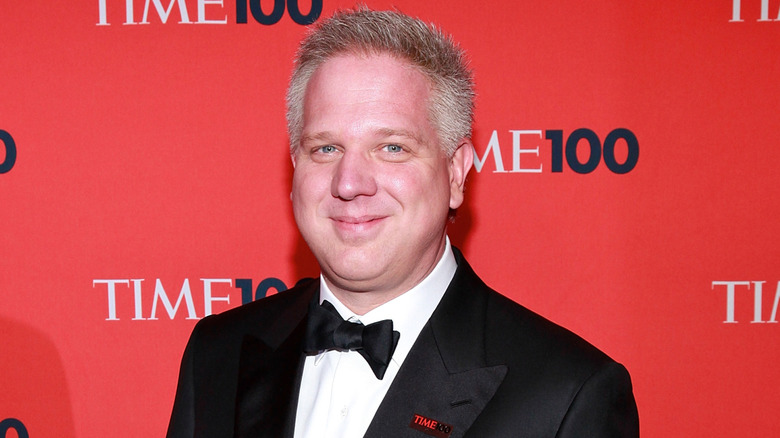 Glenn Beck smiling on Time 100 step-and-repeat