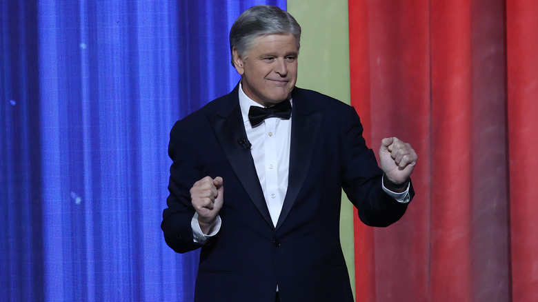 Sean Hannity in tux on stage doing a dance reminiscent of Donald Trump's signature moves