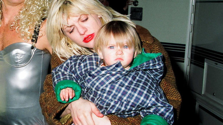 Love holding young Frances Bean