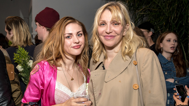 Frances Bean and Love smiling