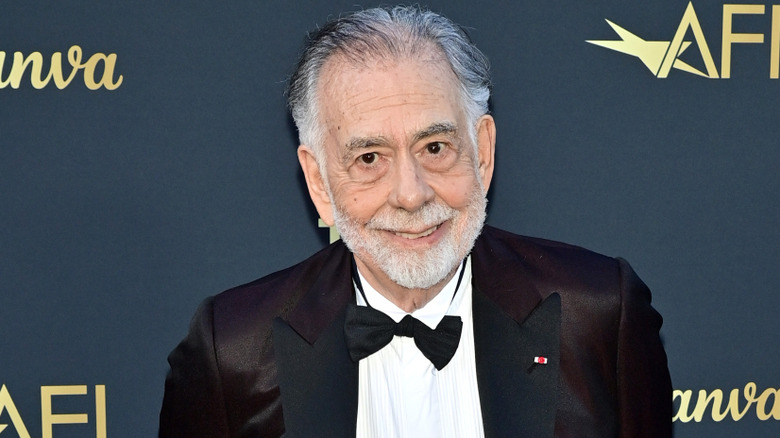 Francis Ford Coppola smiling in tuxedo