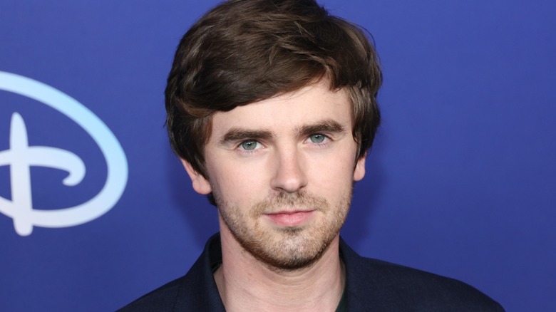 Freddie Highmore posing