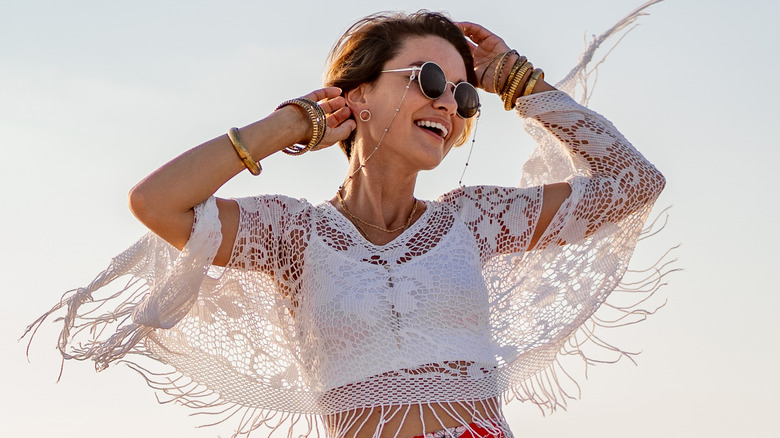 Woman wearing outfit with fringe