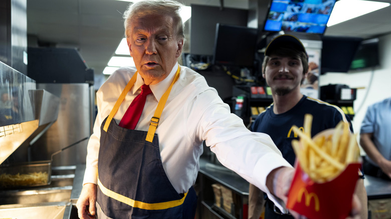 Donald Trump handing a customer fries during his stint at McDonald's