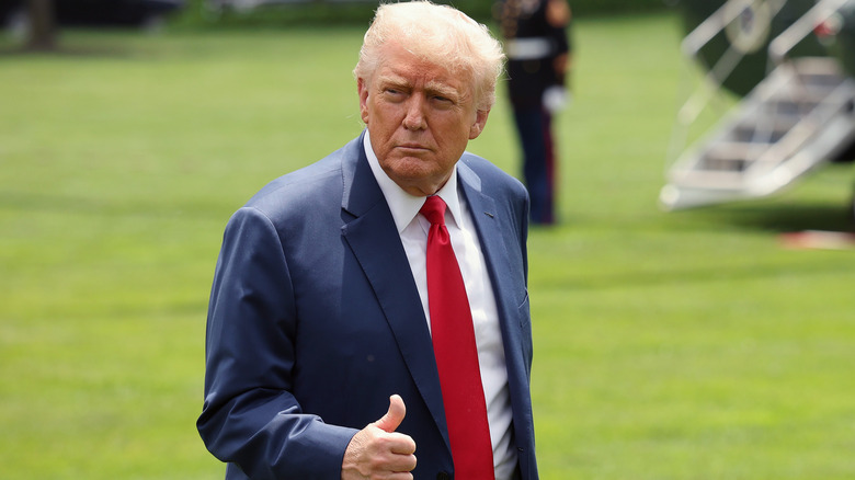 Donald Trump showing a thumbs-up to the cameras