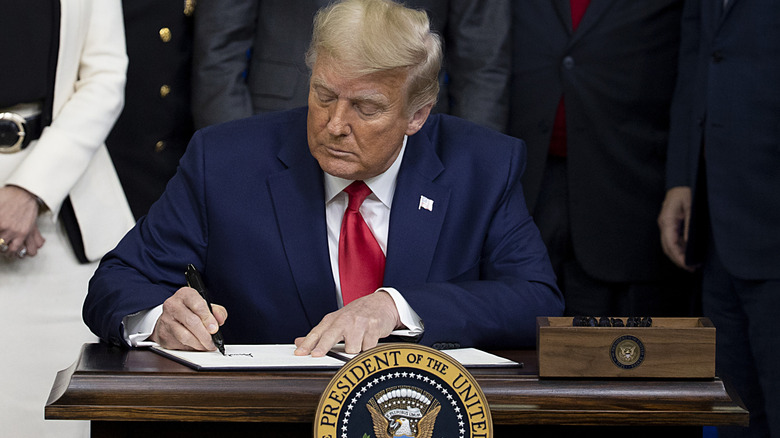 Donald Trump signing an executive order