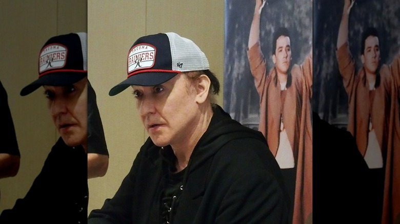 John Cusack signing autographs in 2024 at a convention