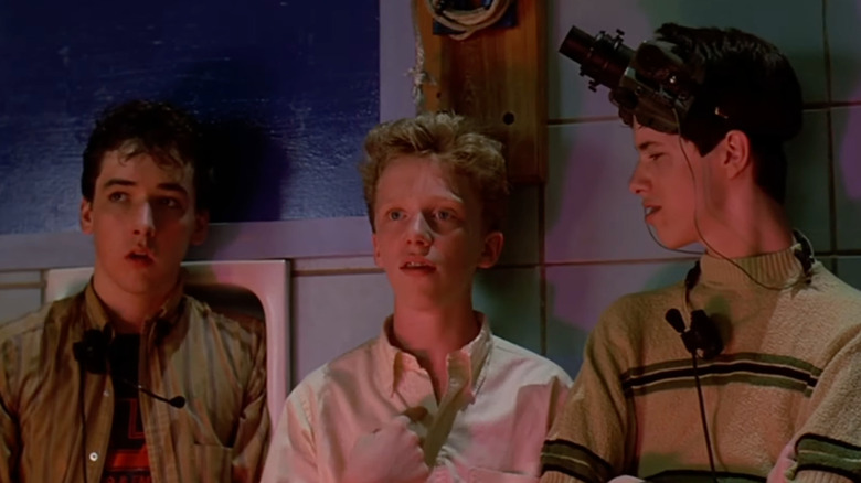 Bryce (John Cusack), Ted (Anthony Michael Hall), and Wease (Darren Harris) in the dance scene from Sixteen Candles