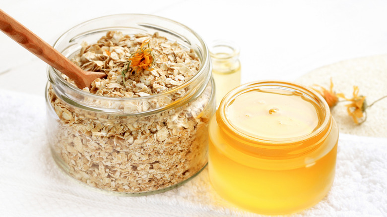 Jar of oats next to a jar of honey
