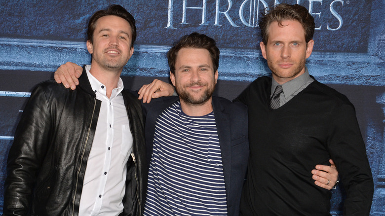 Rob McElhenney, Charlie Day, and Glenn Howerton posing together