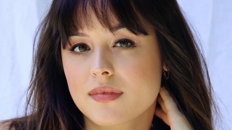 Hayley Orrantia smiling