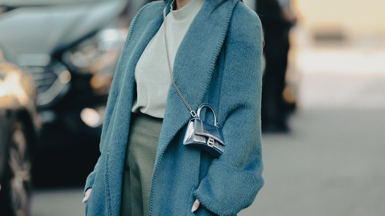 woman wearing mini crossbody bag 