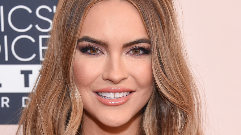 Chrishell Stause smiling with her hair down
