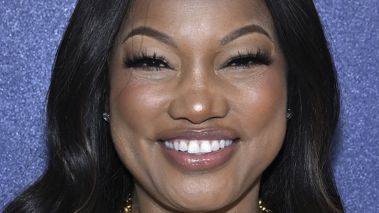 Garcelle Beauvais smiling on red carpet 