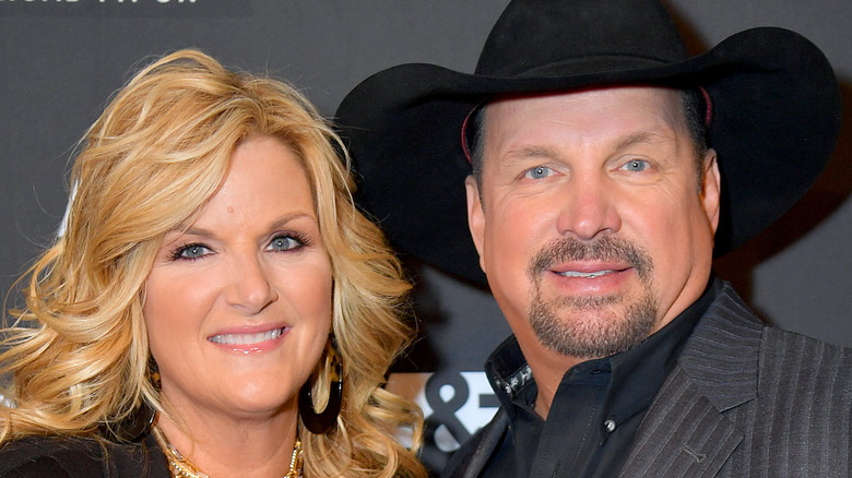 Trisha Yearwood and Garth Brooks on the red carpet 