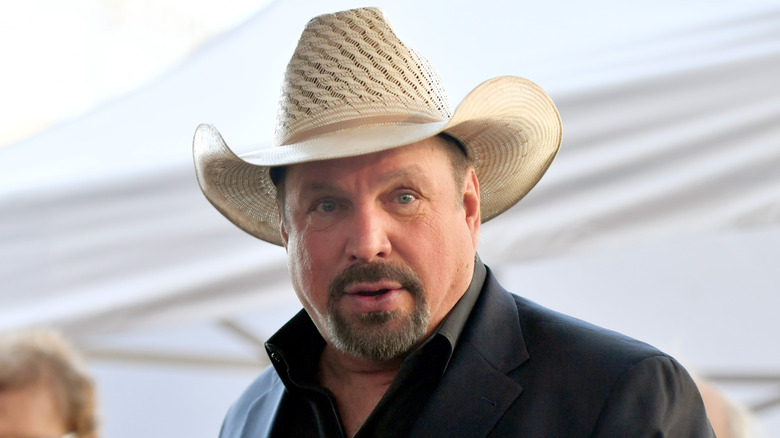 Garth Brooks stares into the camera