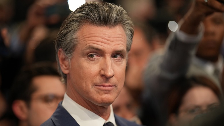 Gavin Newsom speaks to reporters at the McCamish Pavilion in Atlanta, GA (2024)