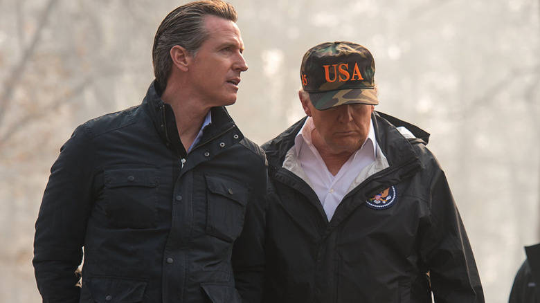 Gavin Newsom and Donald Trump walking side by side as they assess the damage of the 2025 Los Angeles fires