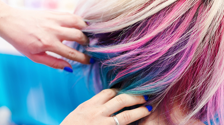 Woman getting hair done