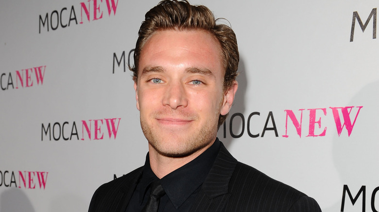 General Hospital's Billy Miller smirking