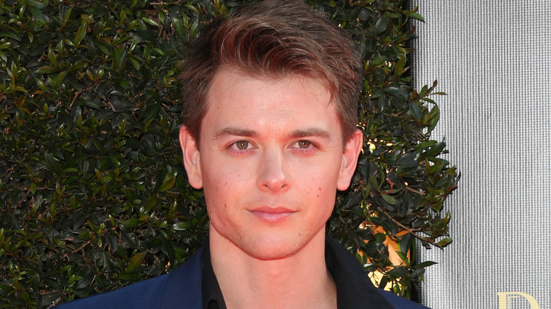 Chad Duell posing at an event