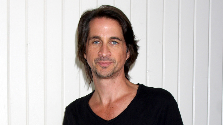 Michael Easton posing at an event