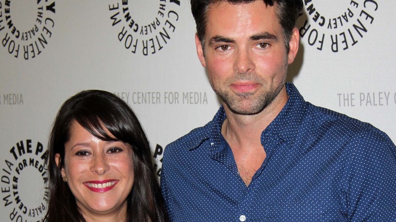 Kimberly McCullough and Jason Thompson posing