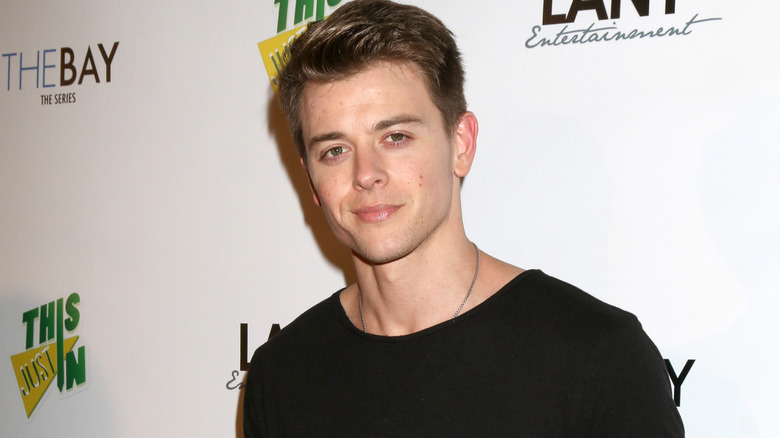 Chad Duell smiling on the red carpet