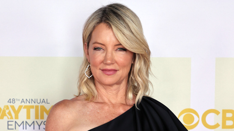 Cynthia Watros wearing a black dress