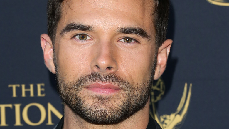 Josh Swickard posing on the red carpet