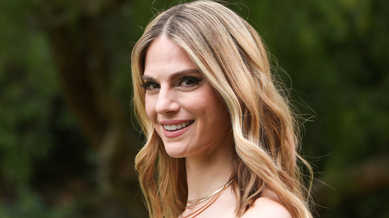 Kelly Kruger smiling side glance
