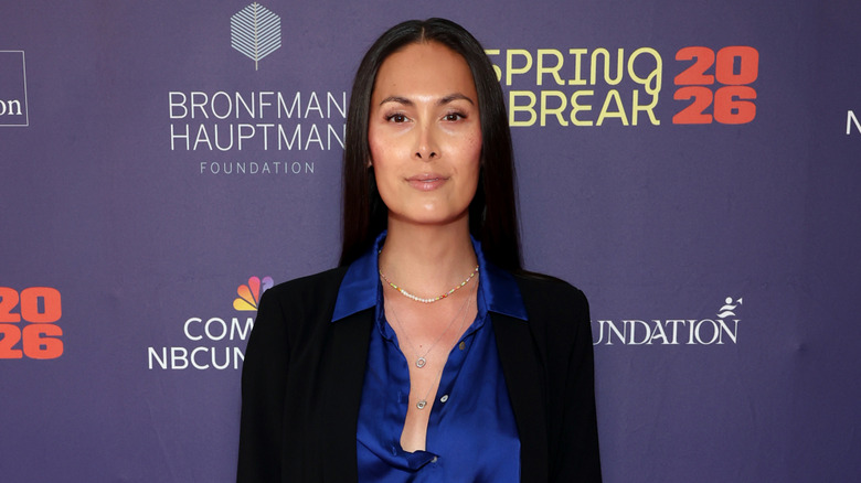 Cassandra James in blue satin shirt and black blazer at Spring Break 2026
