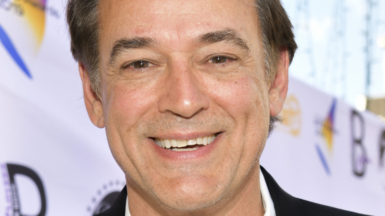 Jon Lindstrom smiling at an event