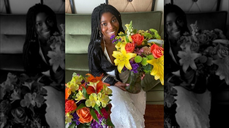 Tabyana Ali holding flowers