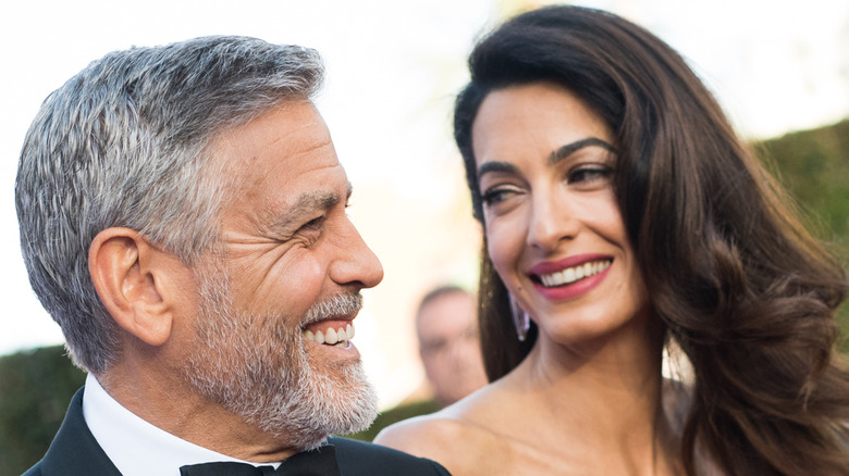 George and Amal laughing