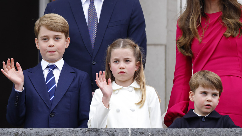 George, Charlotte, and Louis at Buckingham Palace 