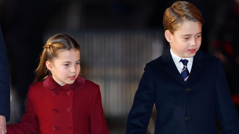 Prince George and Princess Charlotte walking