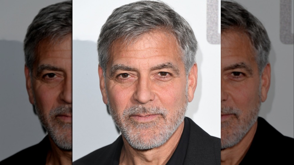 George Clooney wearing black at an event