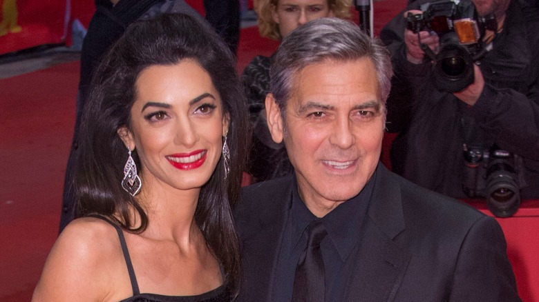 Amal Clooney and George Clooney attend the opening Ceremony for the 66th Berlin Film Festival at the Berlinale Palast in Berlin, Germany, on February 11, 2016 (2016)